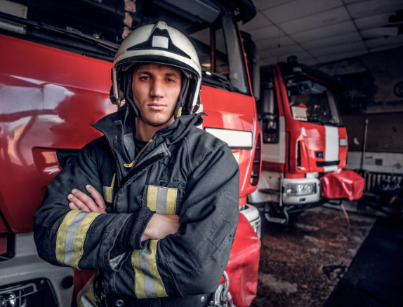 firefighter wearing protective zippers and gear.