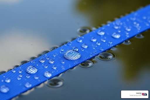 Close-up of a wet strap with water droplets, representing the durability and water resistance of marine zippers.